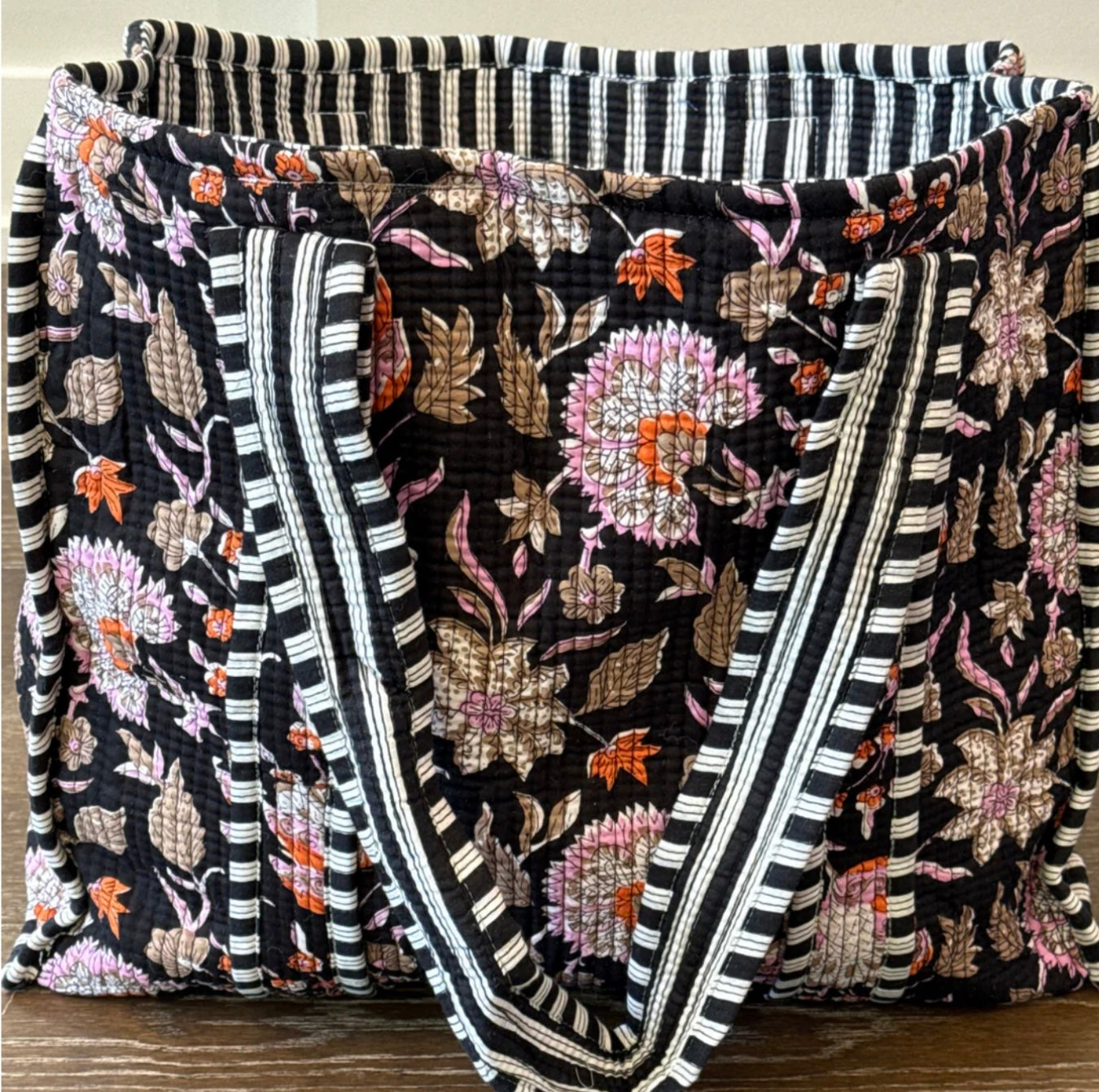 Dark floral quilted tote bag